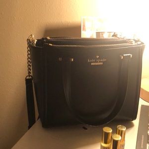 Black and gold Kate Spade crossbody purse
